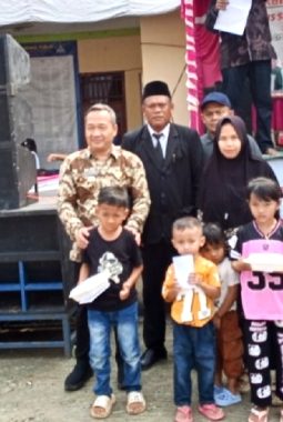 Forkopimcam Leuwidamar Hadiri Santunan Anak Yatim 10 Muharam di Desa Cisimeut Induk